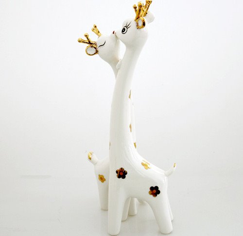 Regale adornos de jirafa a parejas con elegante simplicidad 