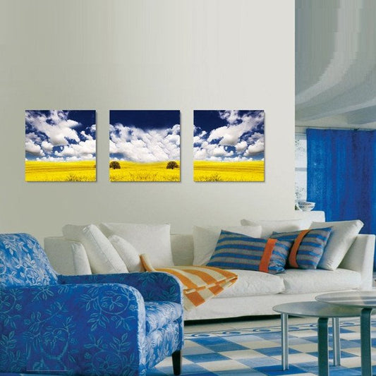 Neu eingetroffene Leinwand-Wanddrucke mit gelben Blumen unter blauem Himmel und weißen Wolken 
