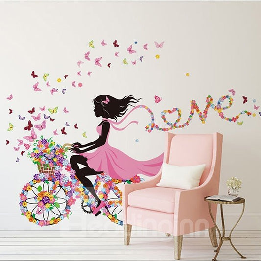 Pegatina de pared impermeable con mariposas de colores y niña montando en bicicleta